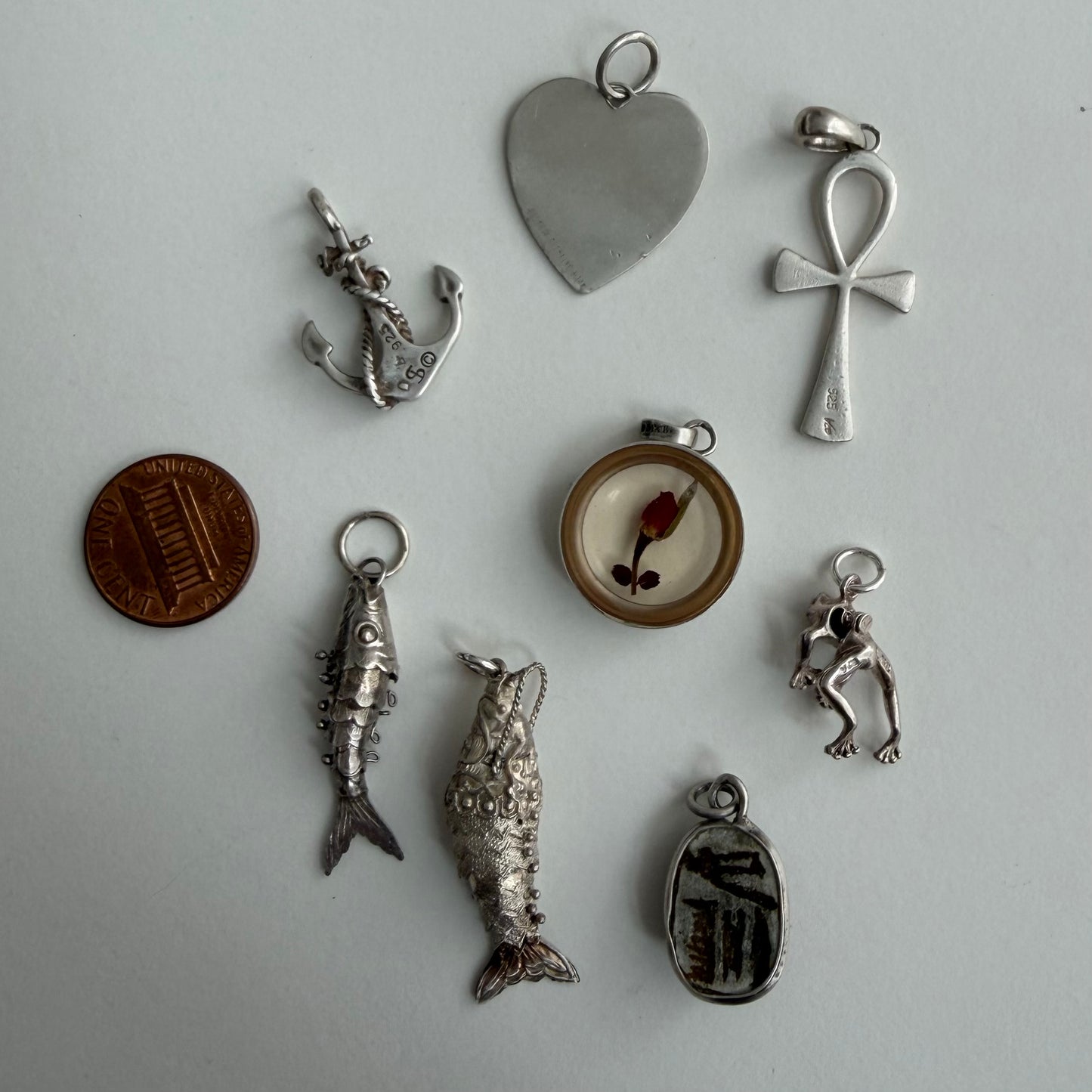LIKE A LIVE // sterling silver pendants / symbolic talismans for your neck mess
