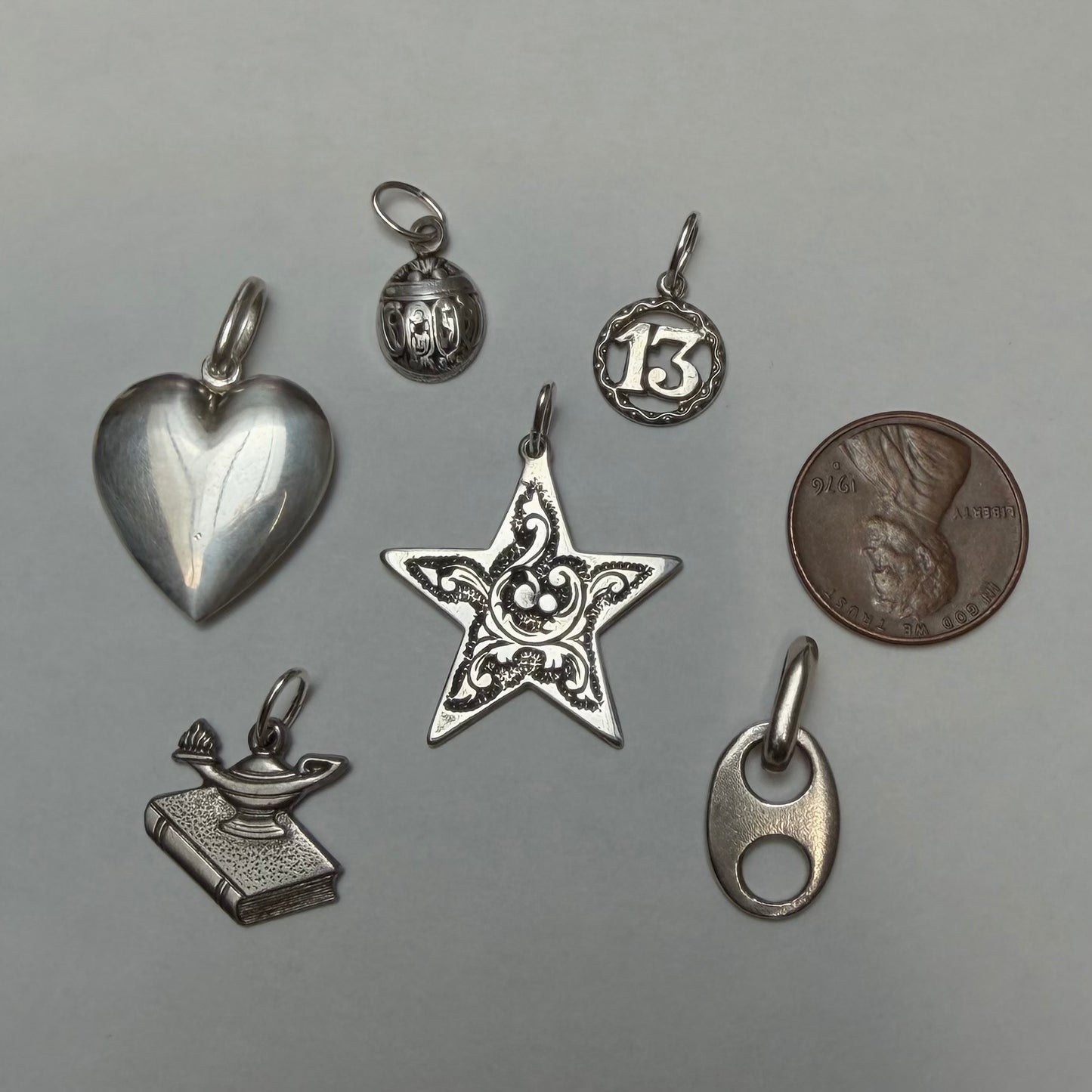 E S T A T E // sterling silver symbolic pendants