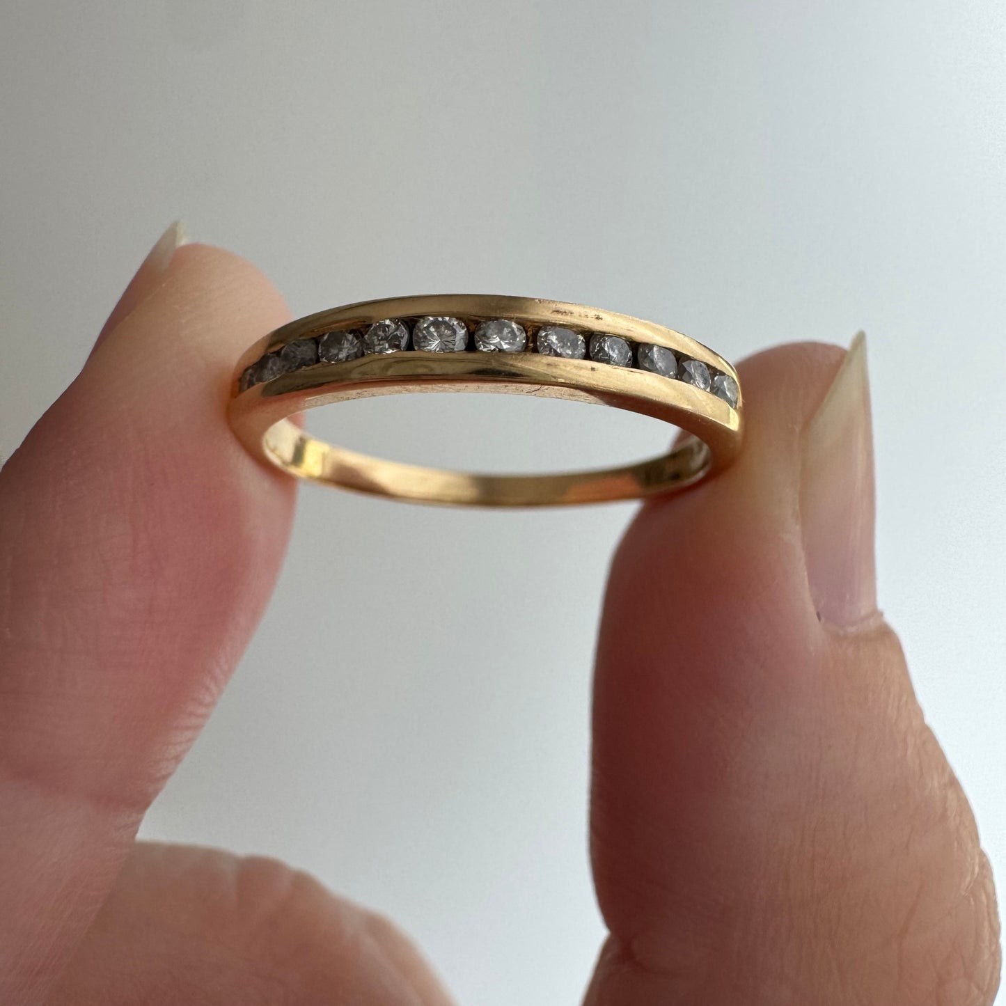 V I N T A G E // a dozen sparkles / 14k yellow gold and 12 channel set diamond half eternity band / size 7.75