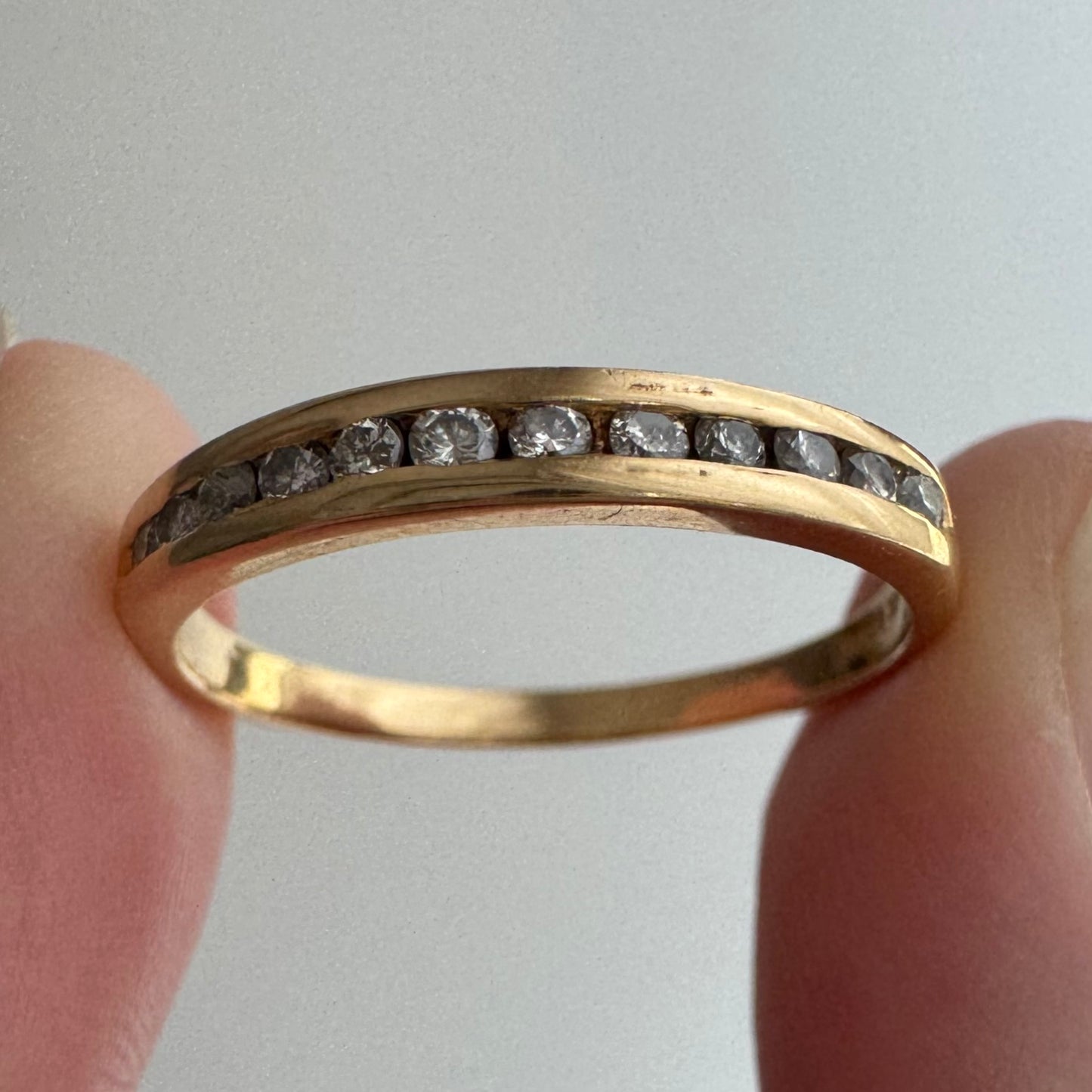 V I N T A G E // a dozen sparkles / 14k yellow gold and 12 channel set diamond half eternity band / size 7.75