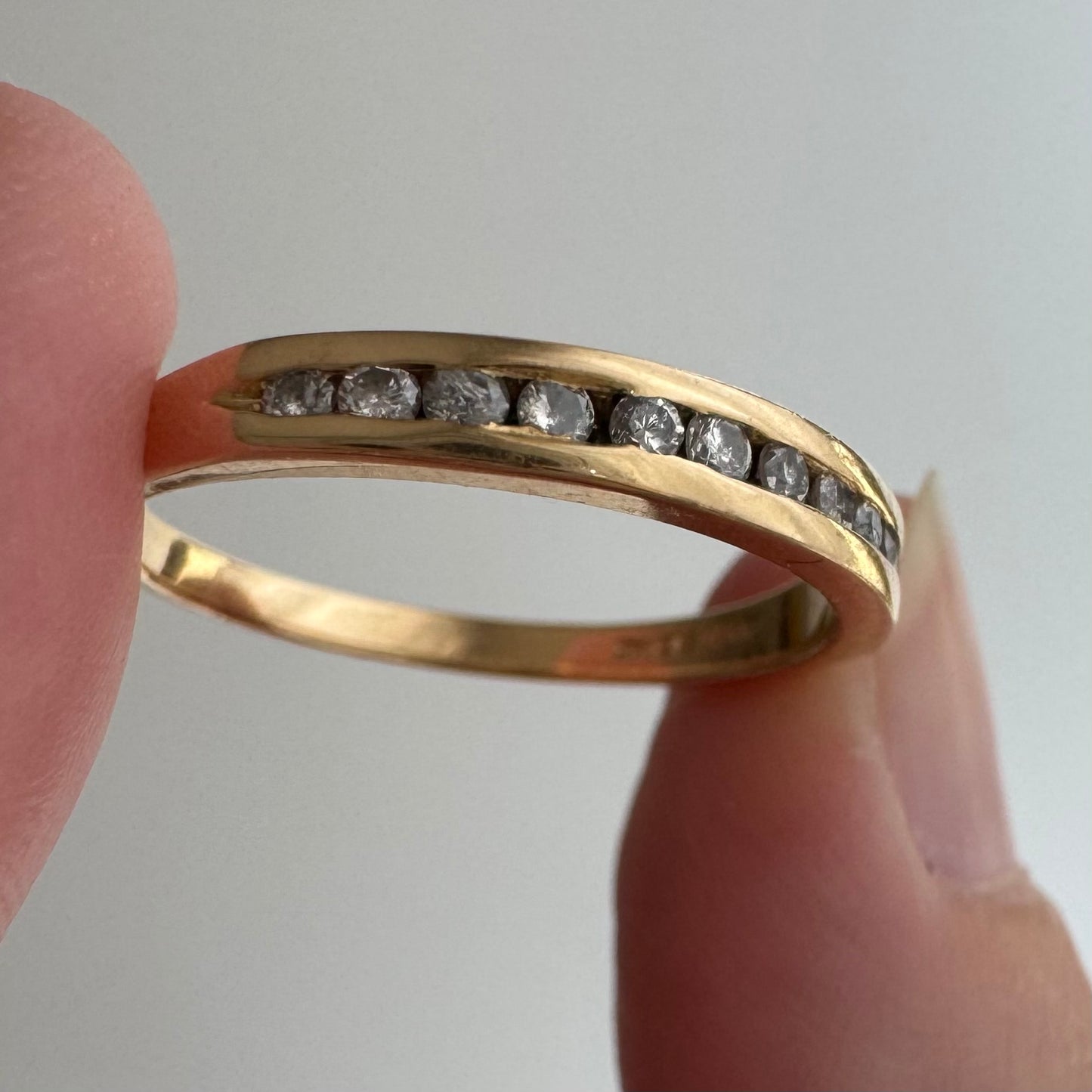 V I N T A G E // a dozen sparkles / 14k yellow gold and 12 channel set diamond half eternity band / size 7.75