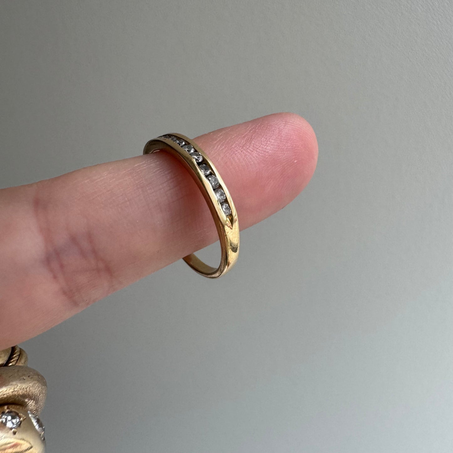 V I N T A G E // a dozen sparkles / 14k yellow gold and 12 channel set diamond half eternity band / size 7.75