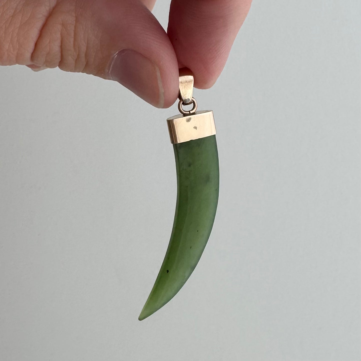 V I N T A G E // enviable green tusk / 14k and green jade tusk or talon / a statement pendant
