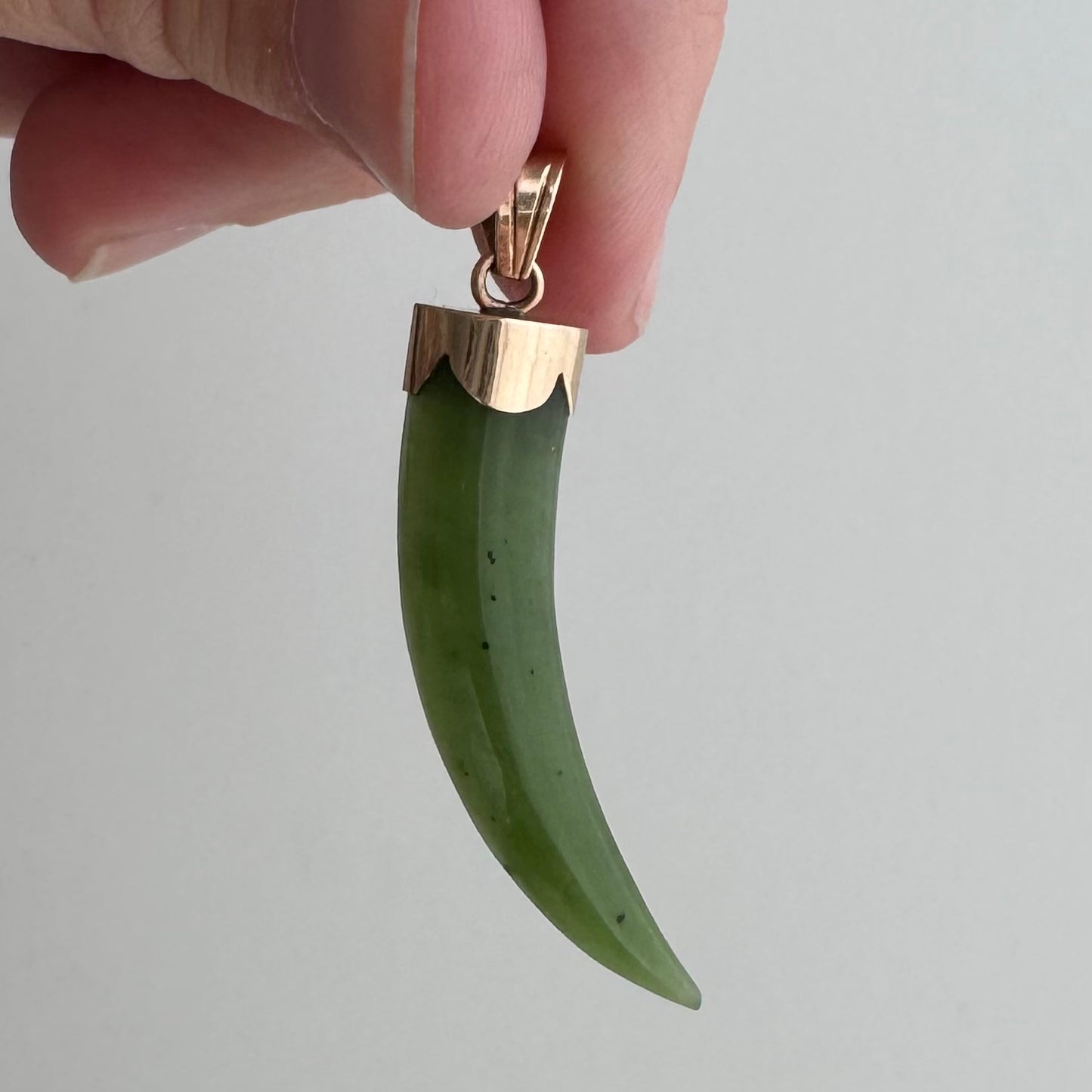 V I N T A G E // enviable green tusk / 14k and green jade tusk or talon / a statement pendant