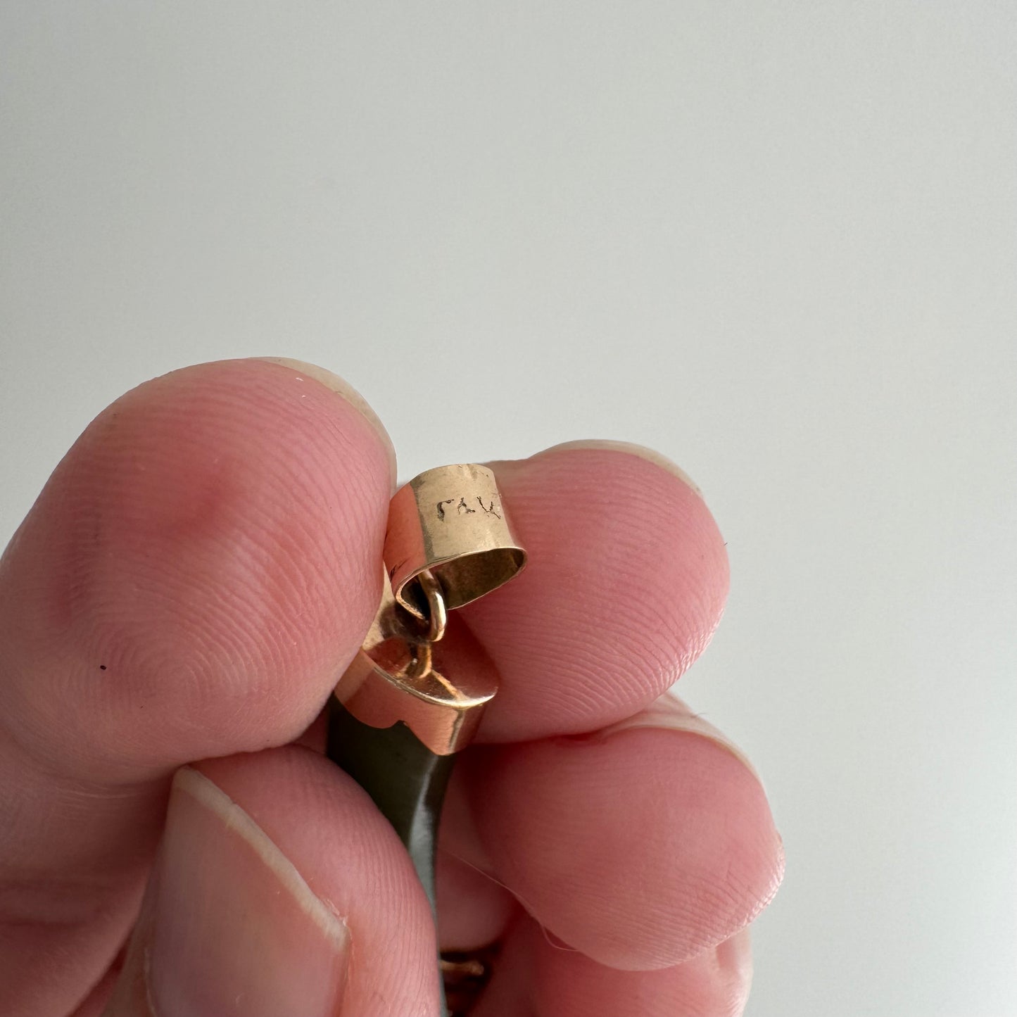 V I N T A G E // enviable green tusk / 14k and green jade tusk or talon / a statement pendant