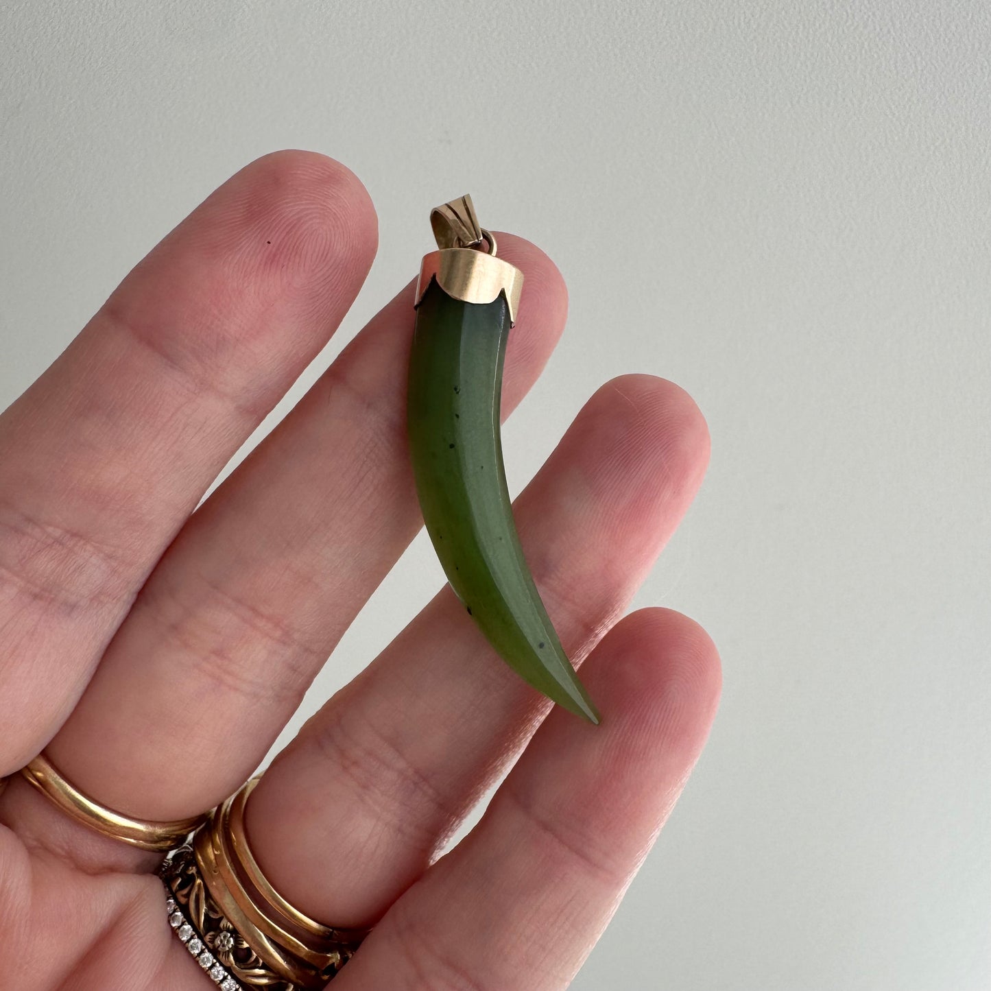 V I N T A G E // enviable green tusk / 14k and green jade tusk or talon / a statement pendant