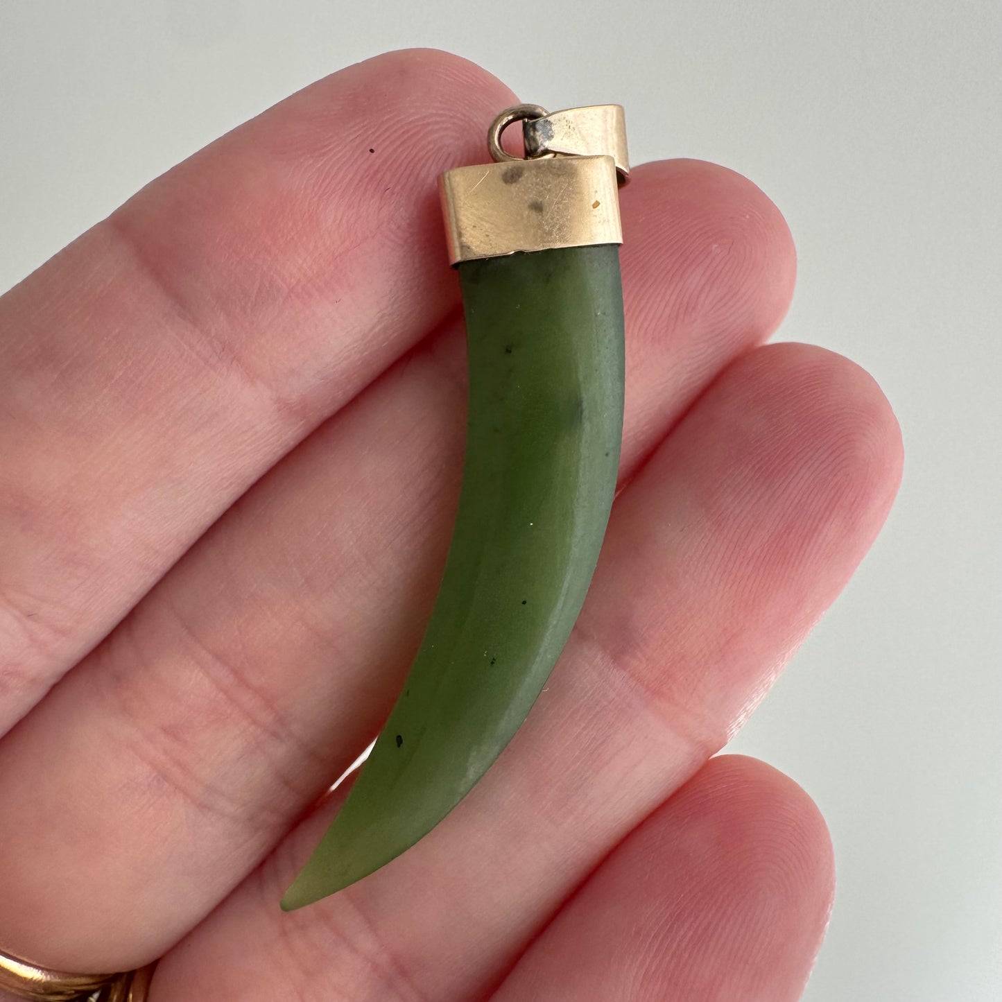 V I N T A G E // enviable green tusk / 14k and green jade tusk or talon / a statement pendant