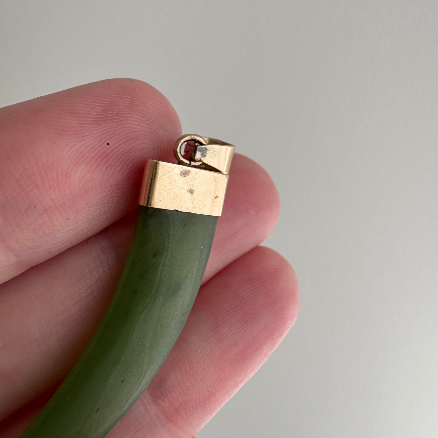 V I N T A G E // enviable green tusk / 14k and green jade tusk or talon / a statement pendant