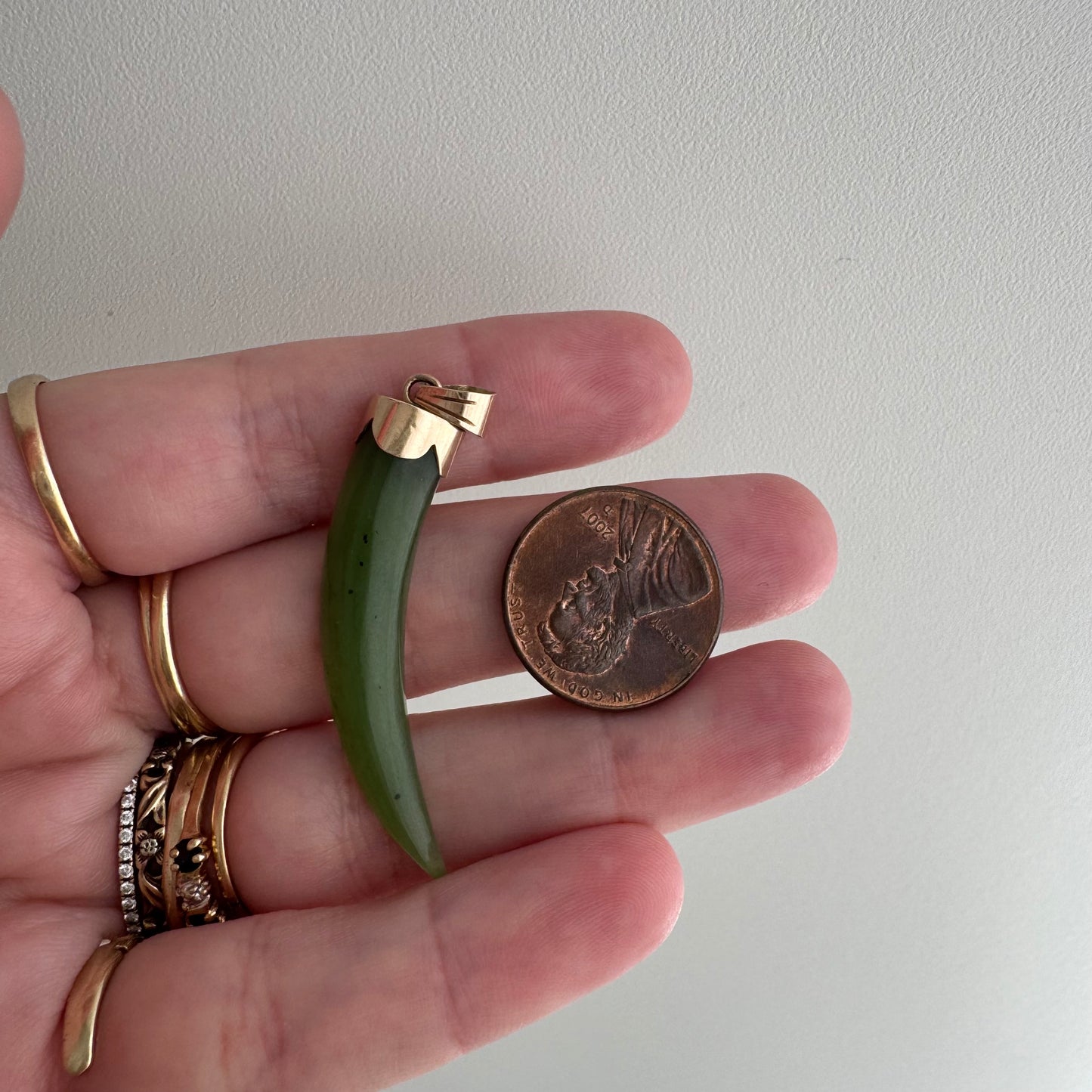 V I N T A G E // enviable green tusk / 14k and green jade tusk or talon / a statement pendant