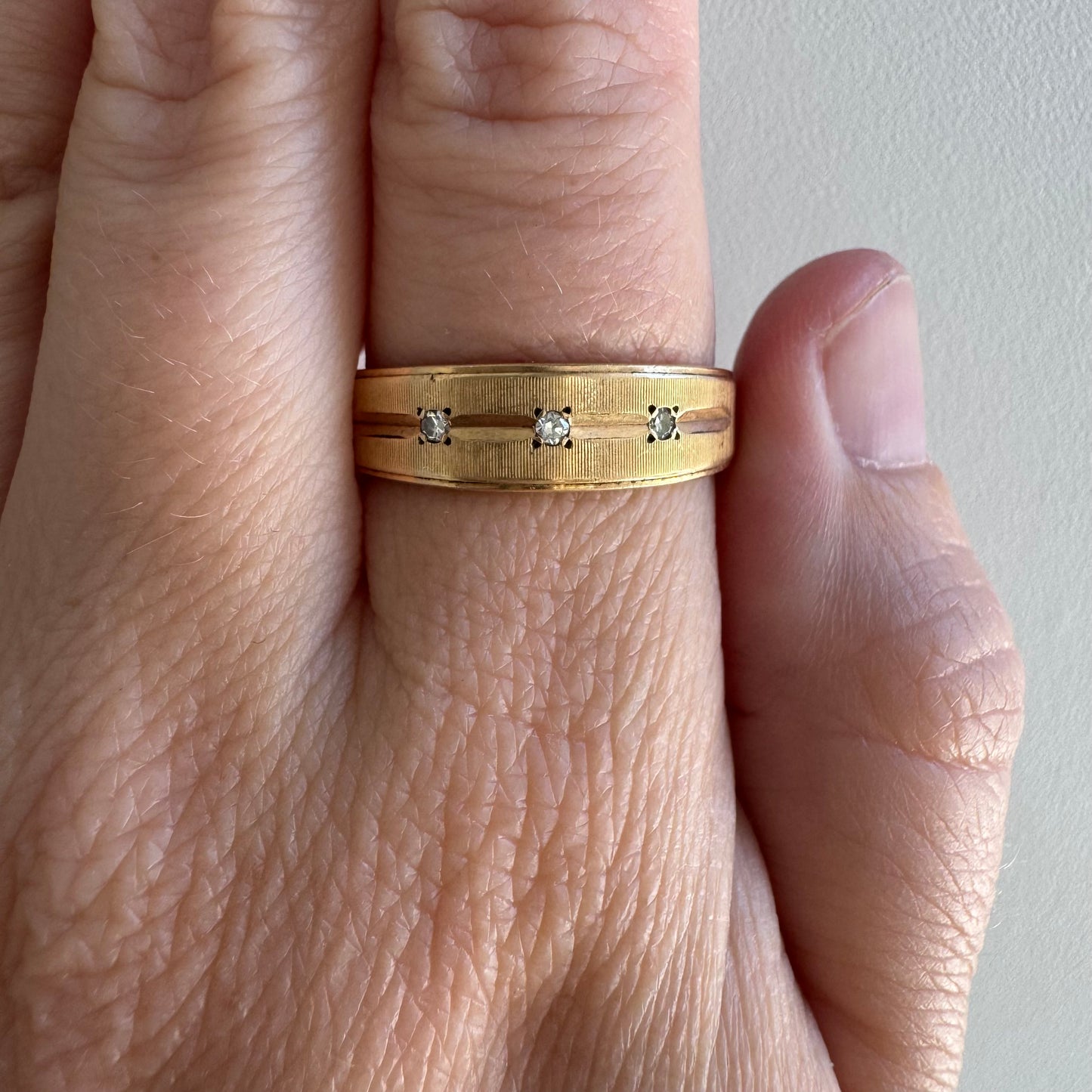 V I N T A G E // subtle stars / 14k and diamond trilogy half eternity tapered wide band / size ~8.75