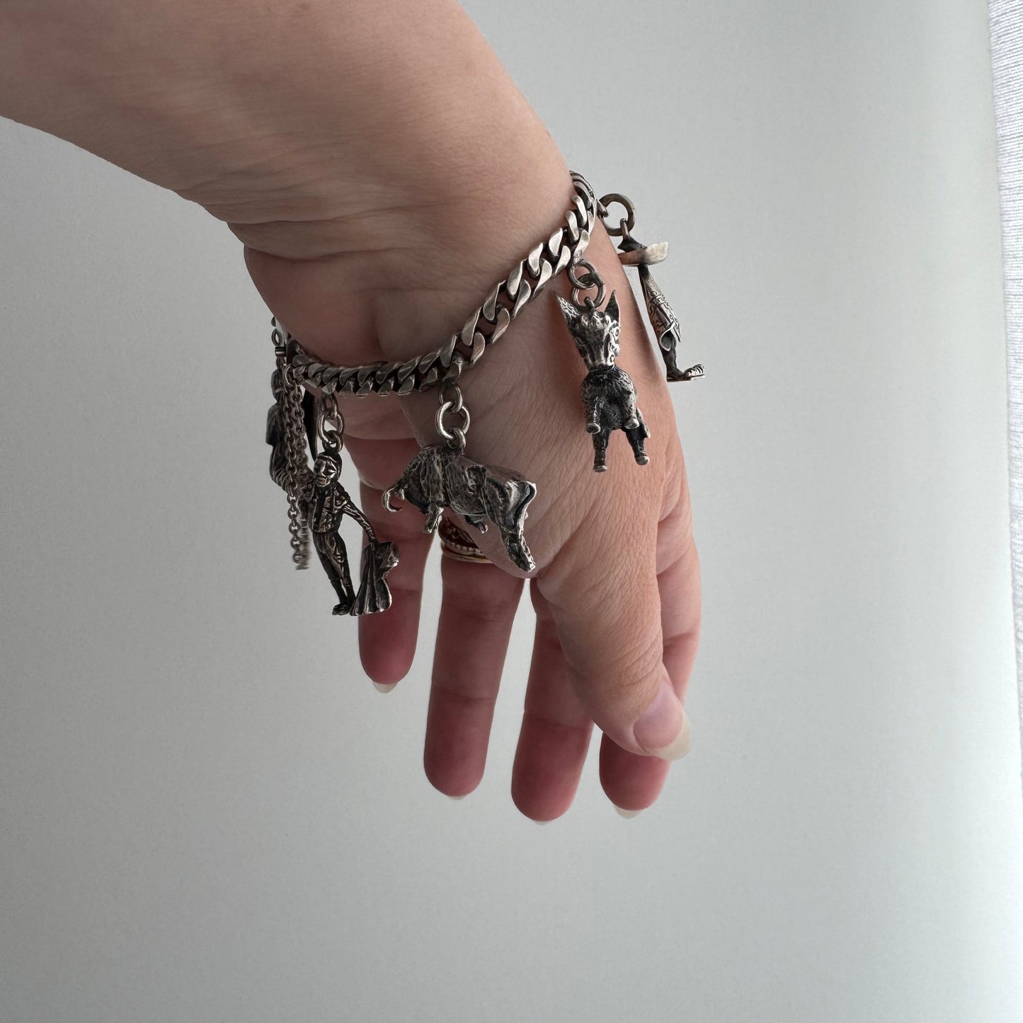 V I N T A G E // many milagros / sterling silver older Mexican charm bracelet / 6.5", 52.3g