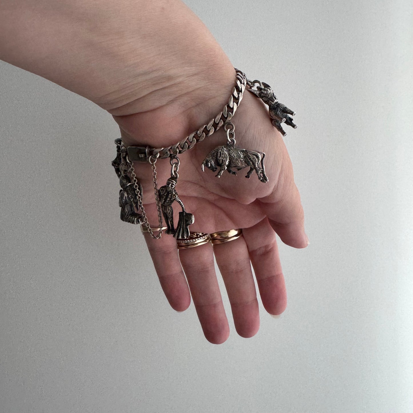 V I N T A G E // many milagros / sterling silver older Mexican charm bracelet / 6.5", 52.3g