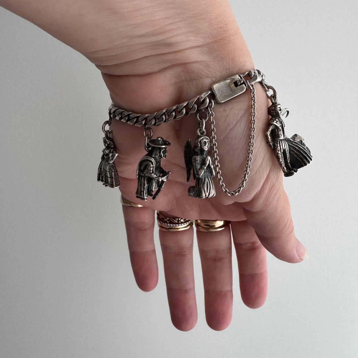 V I N T A G E // many milagros / sterling silver older Mexican charm bracelet / 6.5", 52.3g