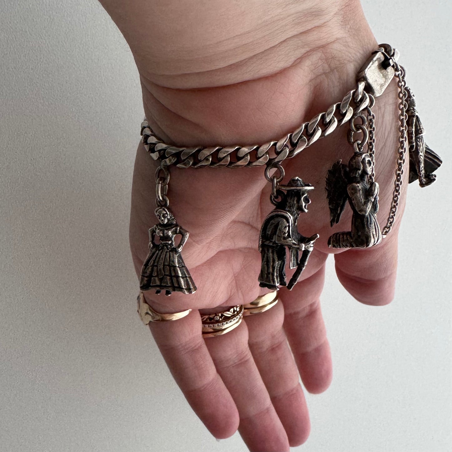 V I N T A G E // many milagros / sterling silver older Mexican charm bracelet / 6.5", 52.3g