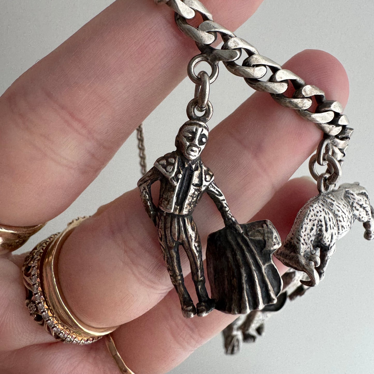 V I N T A G E // many milagros / sterling silver older Mexican charm bracelet / 6.5", 52.3g