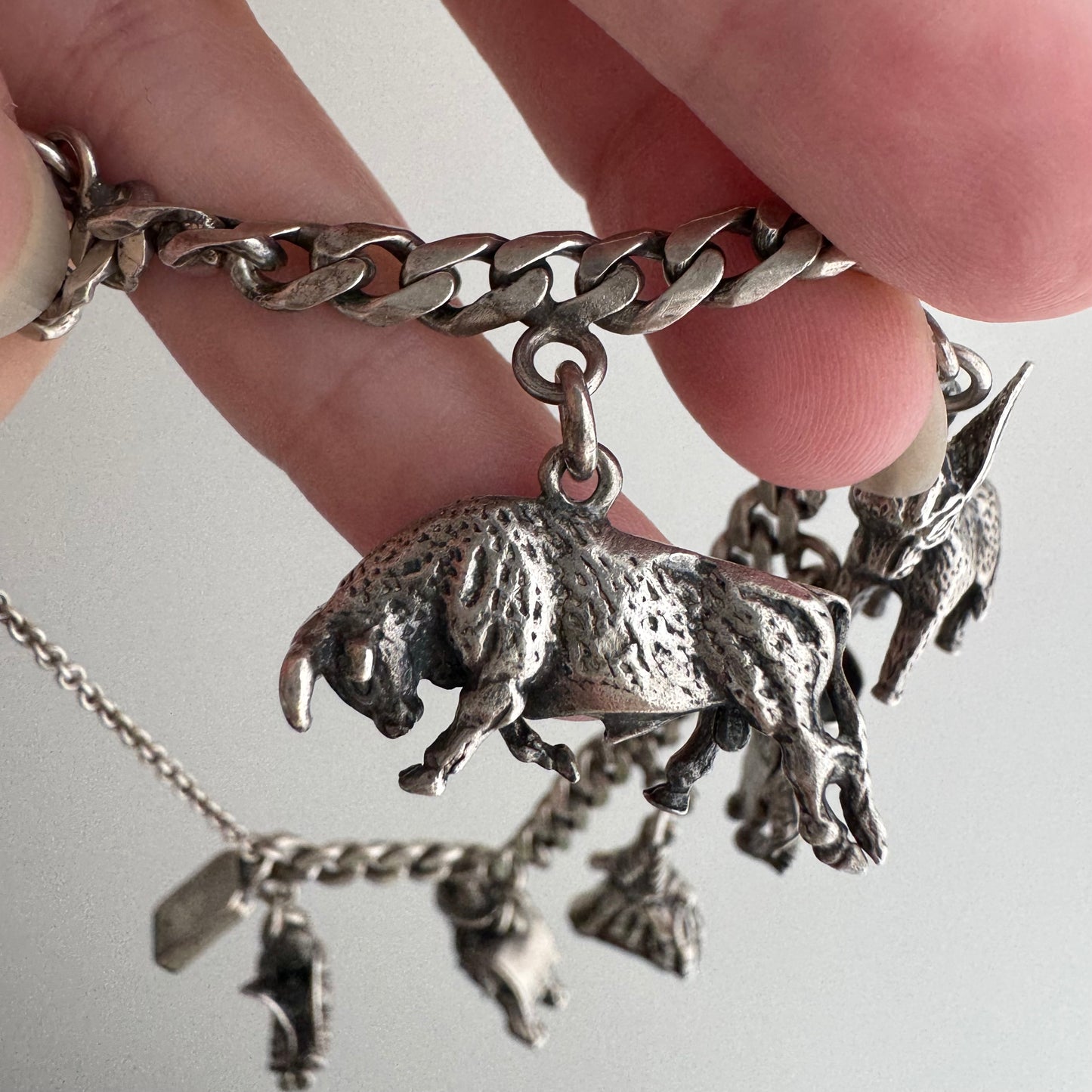 V I N T A G E // many milagros / sterling silver older Mexican charm bracelet / 6.5", 52.3g
