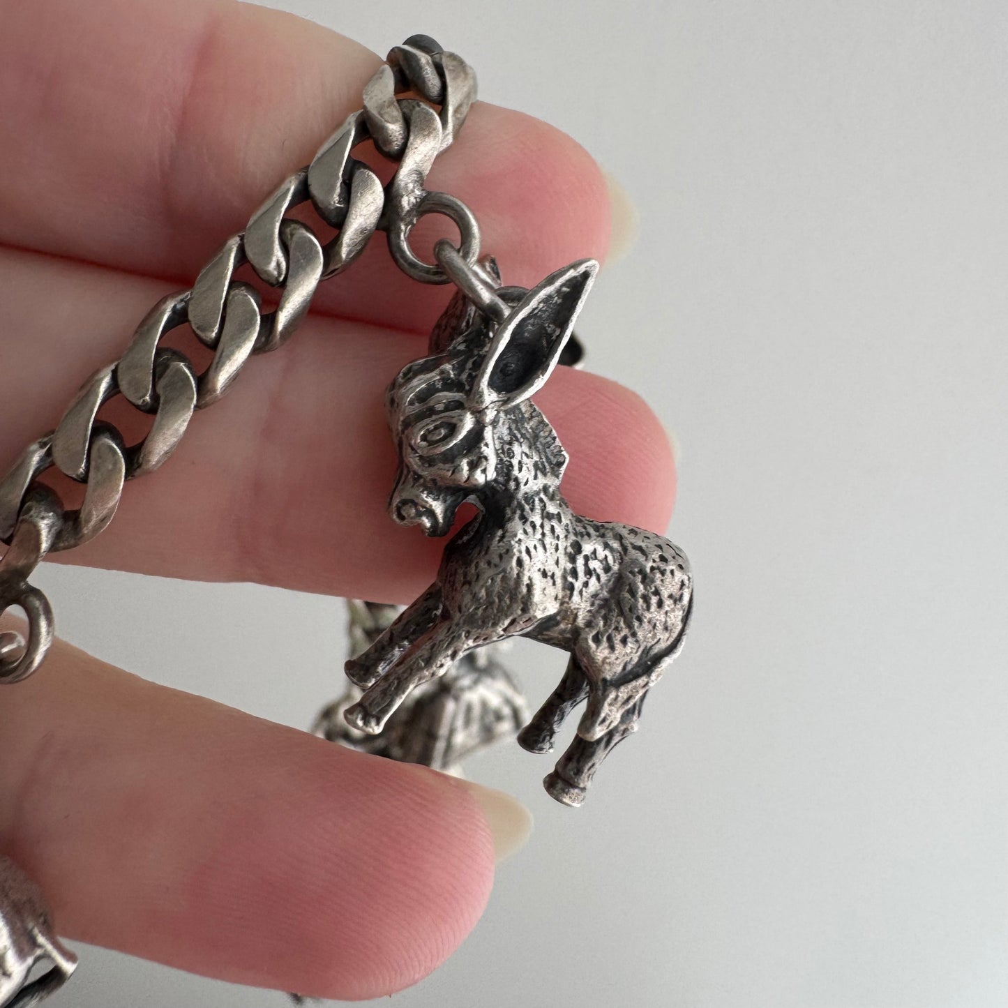 V I N T A G E // many milagros / sterling silver older Mexican charm bracelet / 6.5", 52.3g