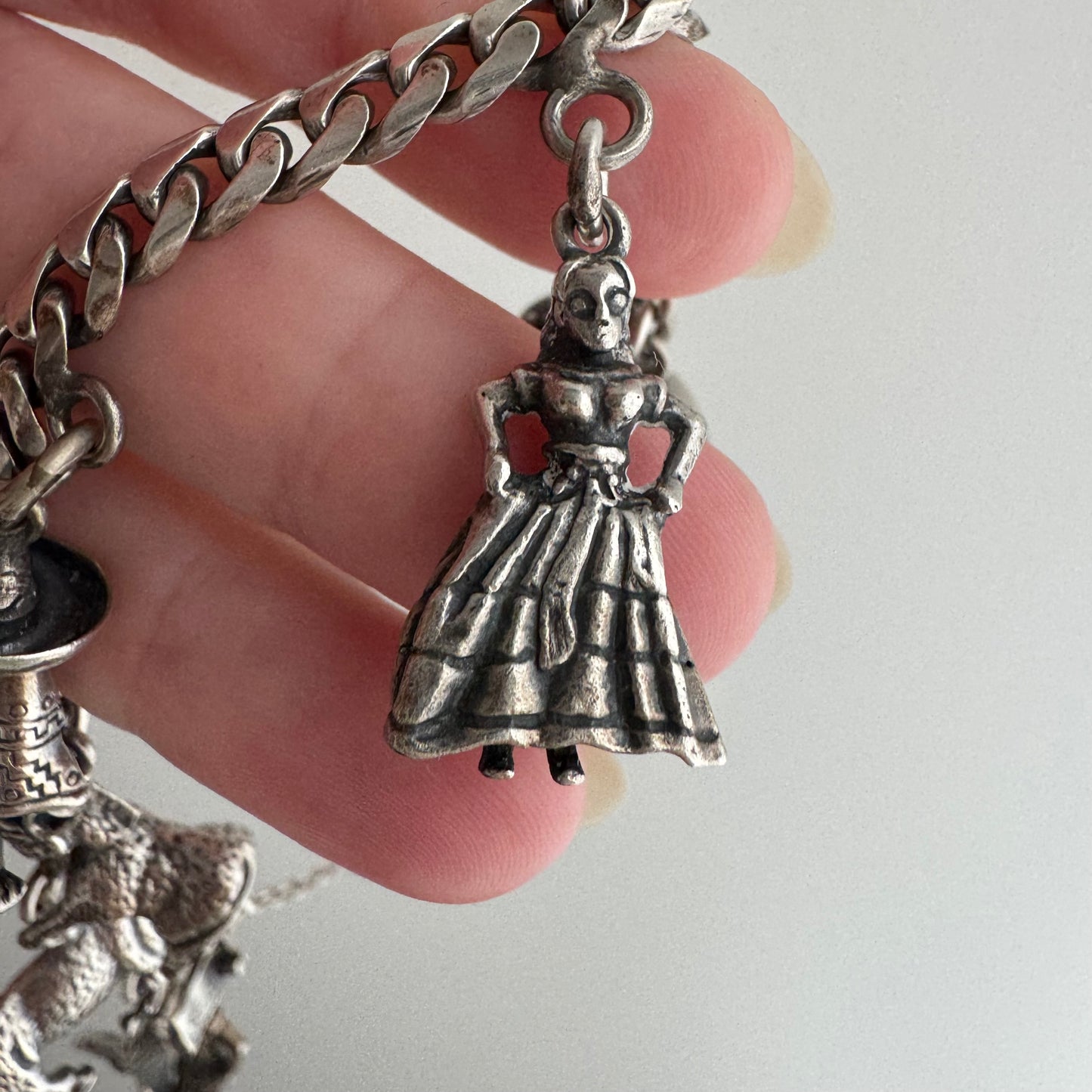 V I N T A G E // many milagros / sterling silver older Mexican charm bracelet / 6.5", 52.3g