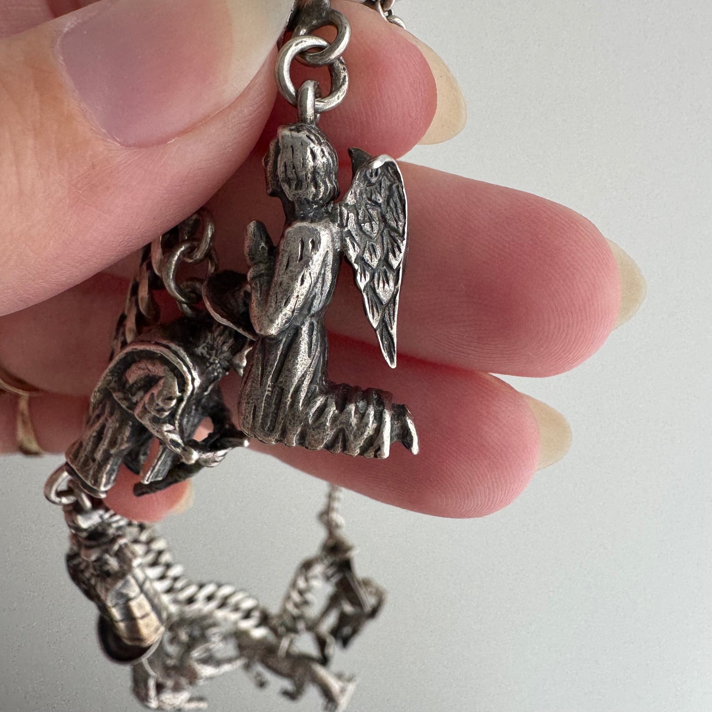 V I N T A G E // many milagros / sterling silver older Mexican charm bracelet / 6.5", 52.3g