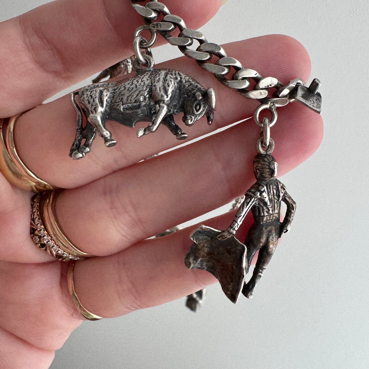 V I N T A G E // many milagros / sterling silver older Mexican charm bracelet / 6.5", 52.3g