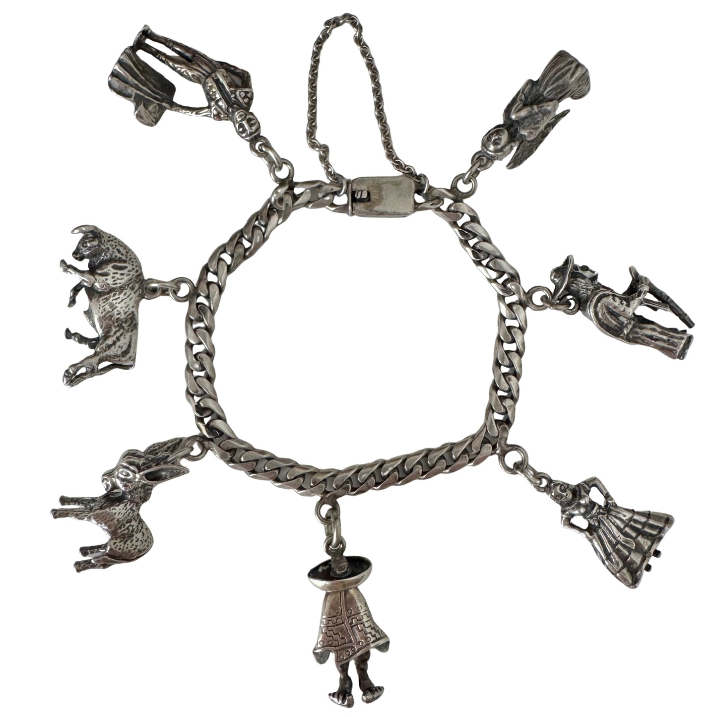 V I N T A G E // many milagros / sterling silver older Mexican charm bracelet / 6.5", 52.3g
