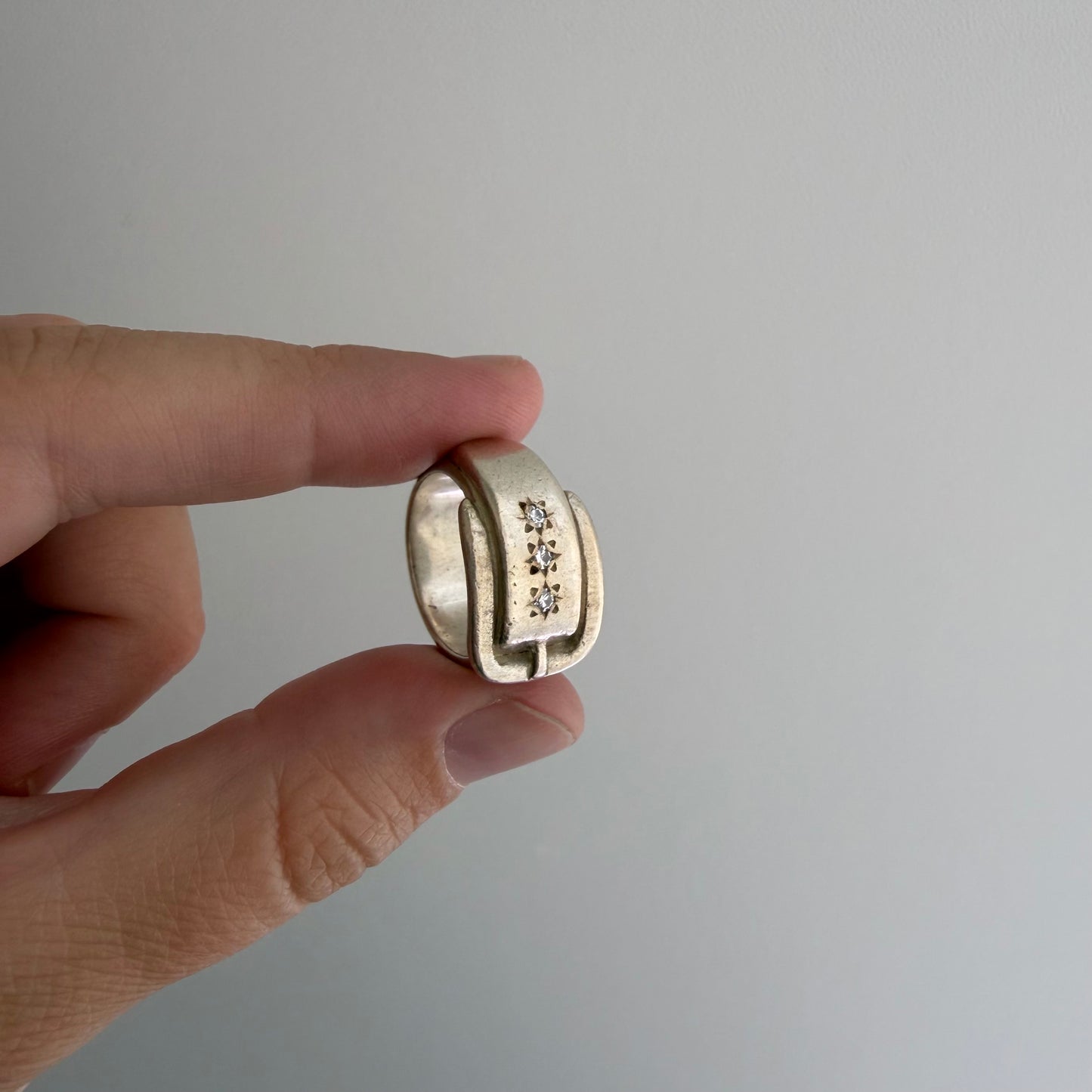 V I N T A G E // timeless stars / sterling silver + star set diamond wide buckle band / size 4ish
