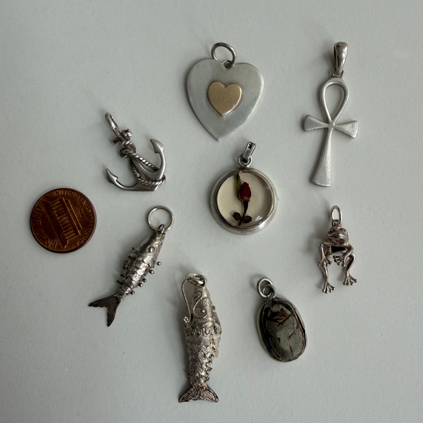 LIKE A LIVE // sterling silver pendants / symbolic talismans for your neck mess
