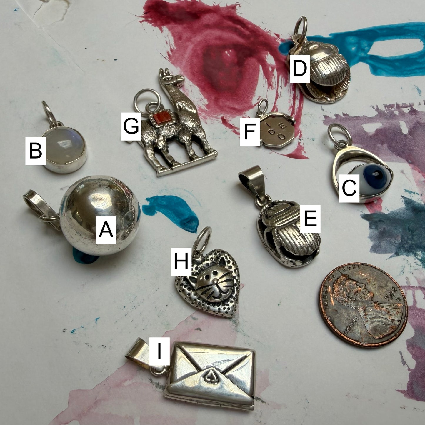 LIKE A LIVE // sterling silver pendants / symbolic and charming talismans for your neck mess
