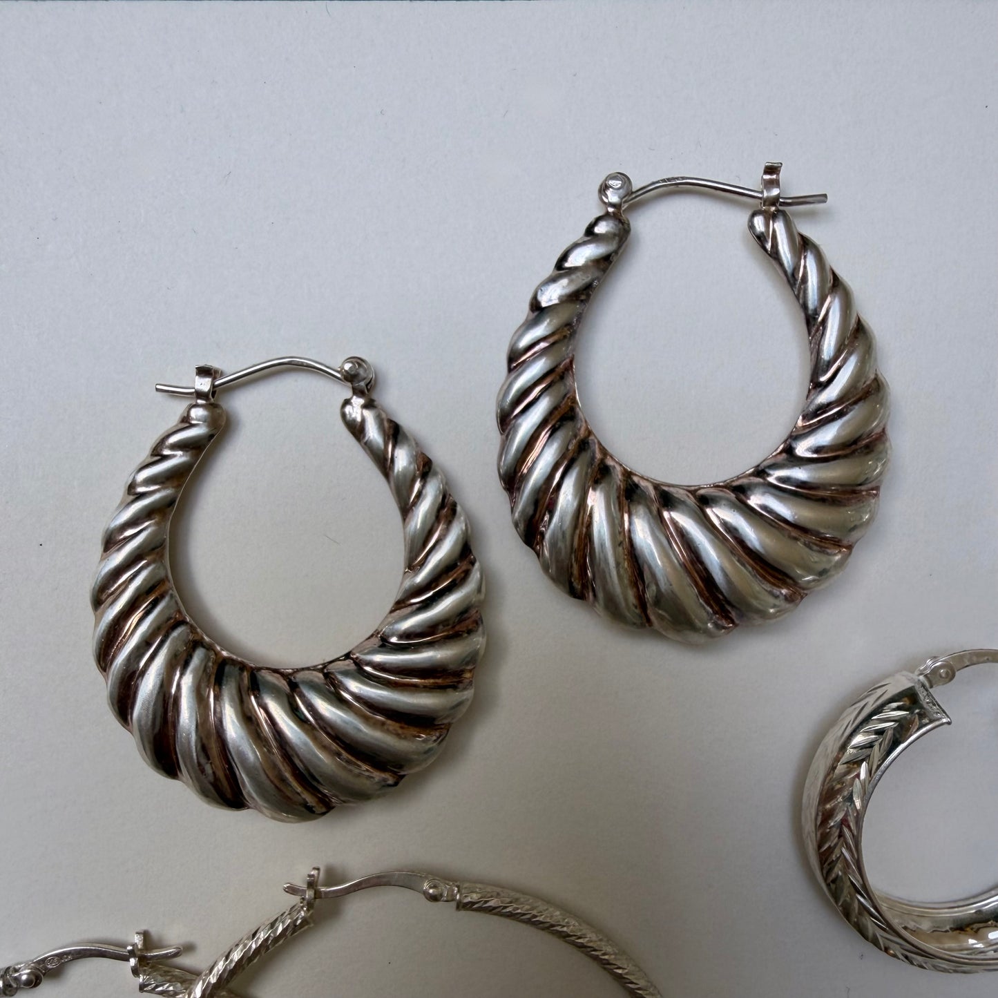 E S T A T E // a bunch of sterling silver hoop earrings