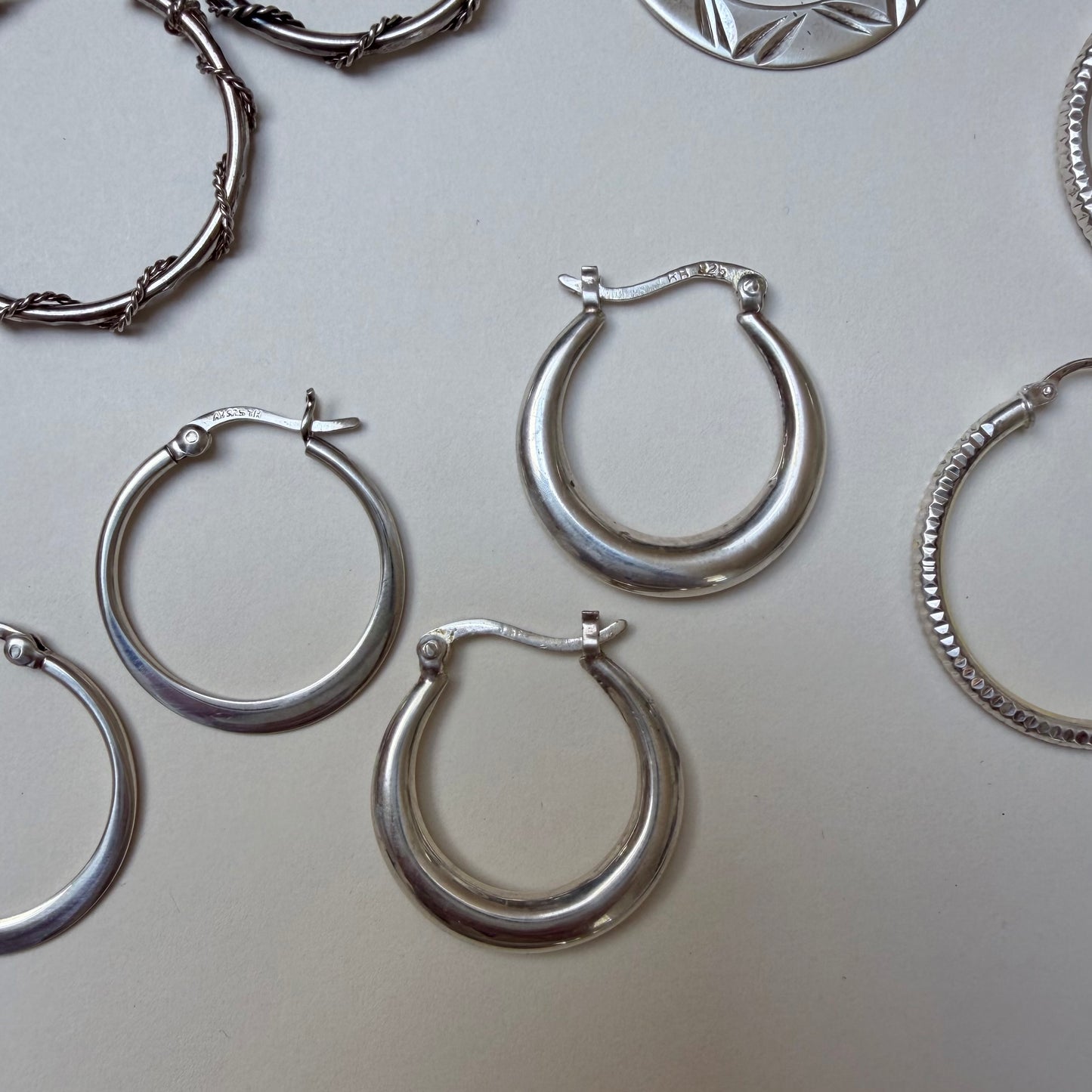 E S T A T E // a bunch of sterling silver hoop earrings