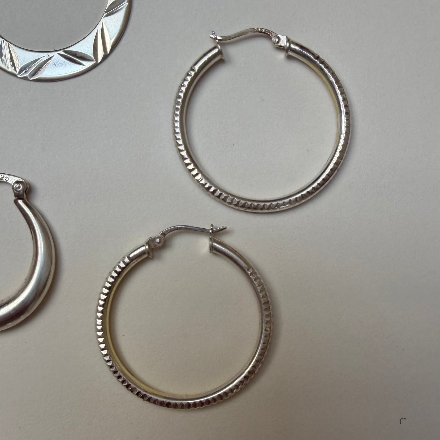 E S T A T E // a bunch of sterling silver hoop earrings