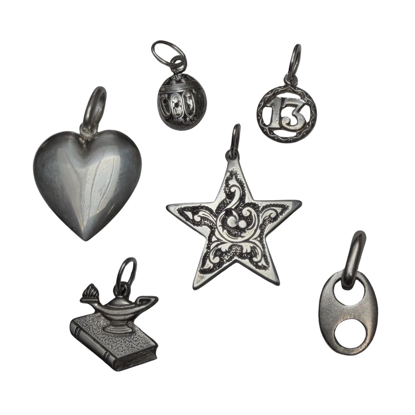 E S T A T E // sterling silver symbolic pendants