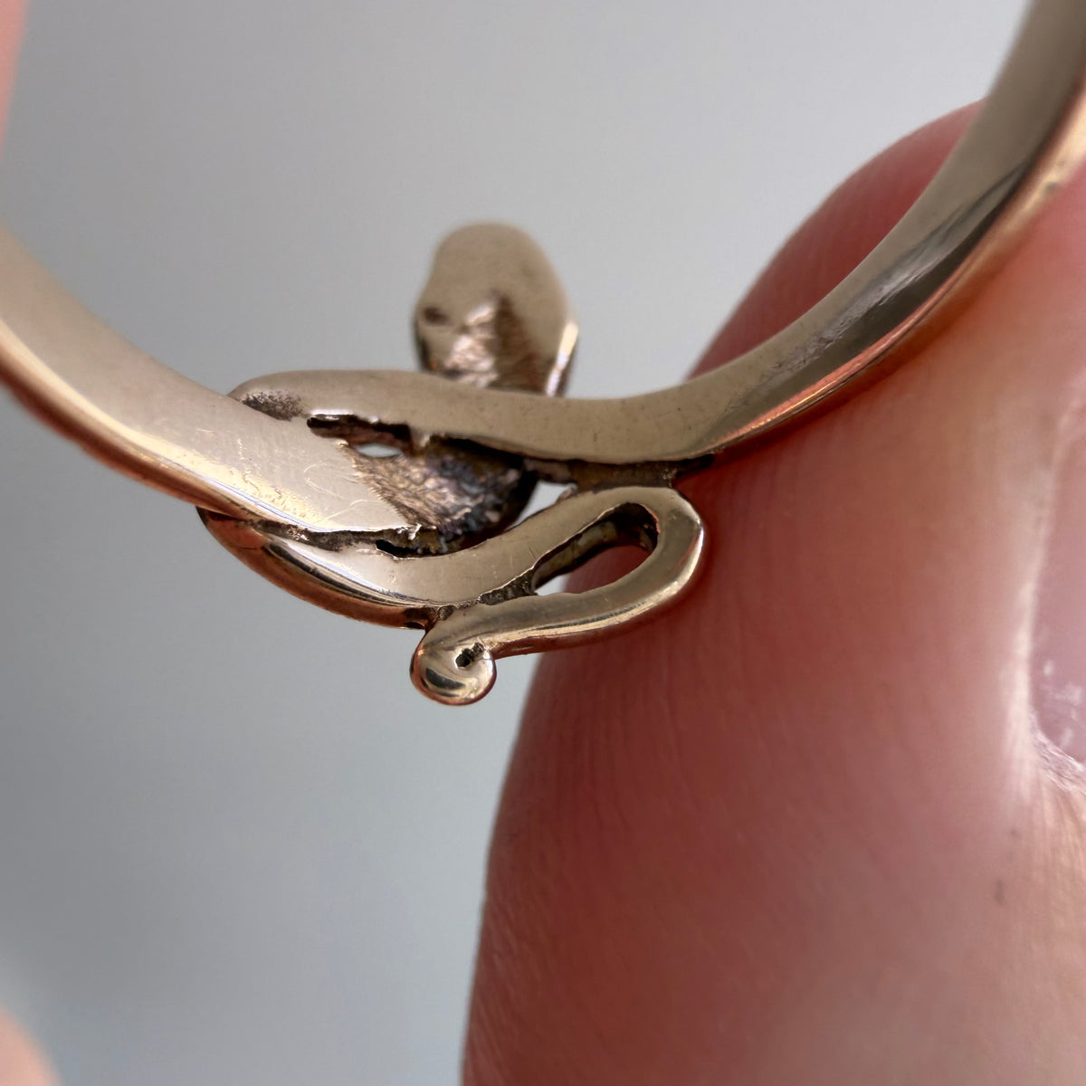 V I N T A G E // knotted embrace / 10k yellow gold snake ring with ruby eyes / size 4.5