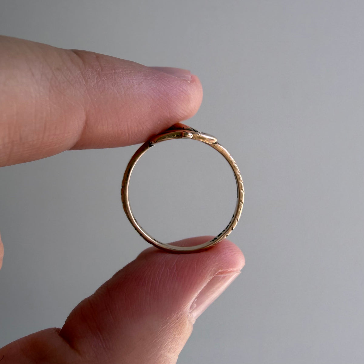 V I N T A G E // knotted embrace / 10k yellow gold snake ring with ruby eyes / size 4.5