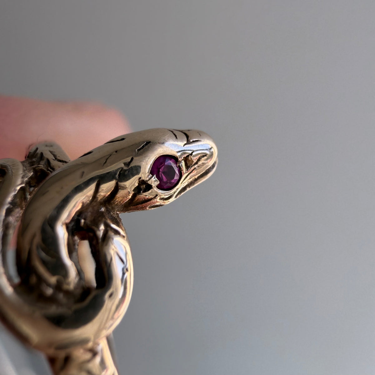 V I N T A G E // knotted embrace / 10k yellow gold snake ring with ruby eyes / size 4.5