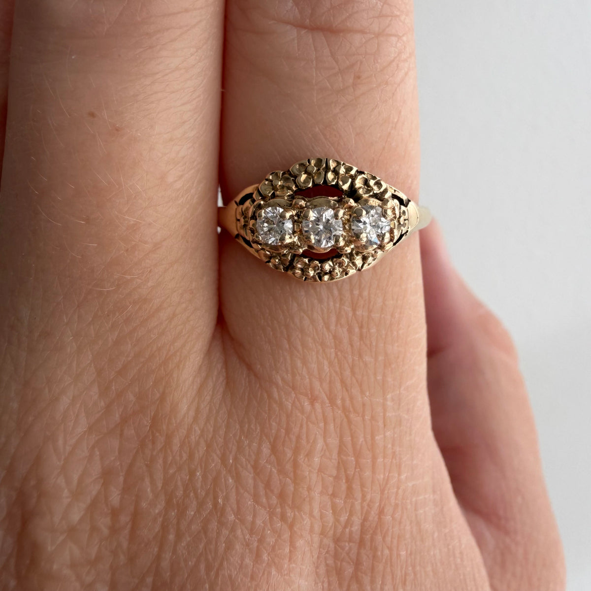 V I N T A G E // floral resilience / 1930s three stone floral east west navette ring with new diamonds / size 7