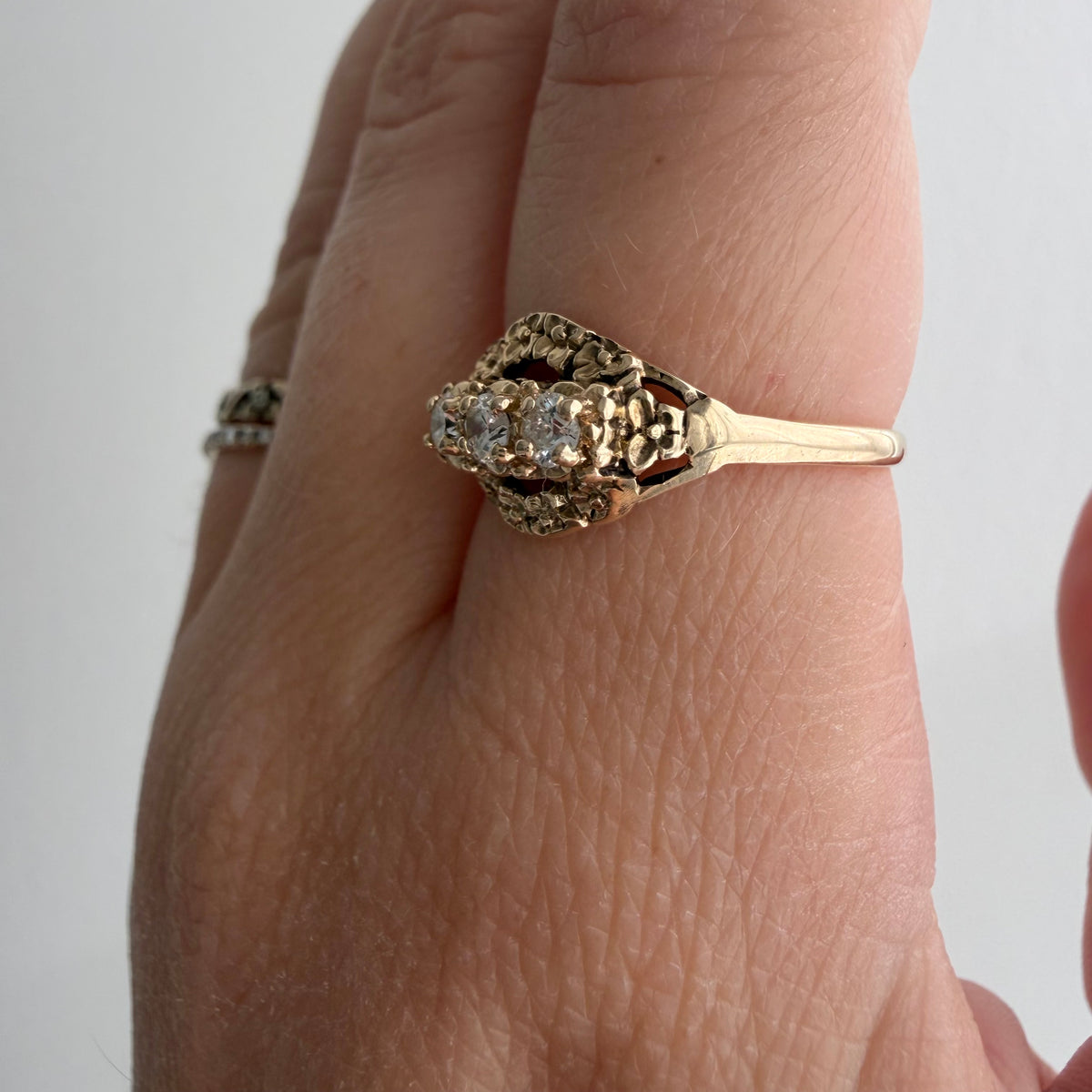 V I N T A G E // floral resilience / 1930s three stone floral east west navette ring with new diamonds / size 7