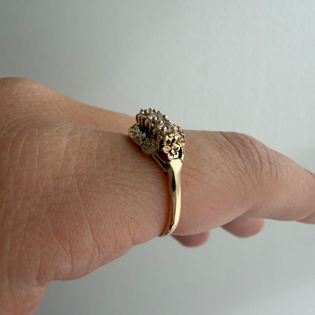 V I N T A G E // floral resilience / 1930s three stone floral east west navette ring with new diamonds / size 7