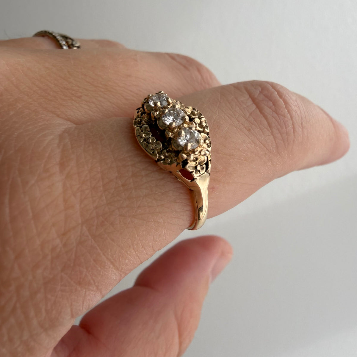 V I N T A G E // floral resilience / 1930s three stone floral east west navette ring with new diamonds / size 7