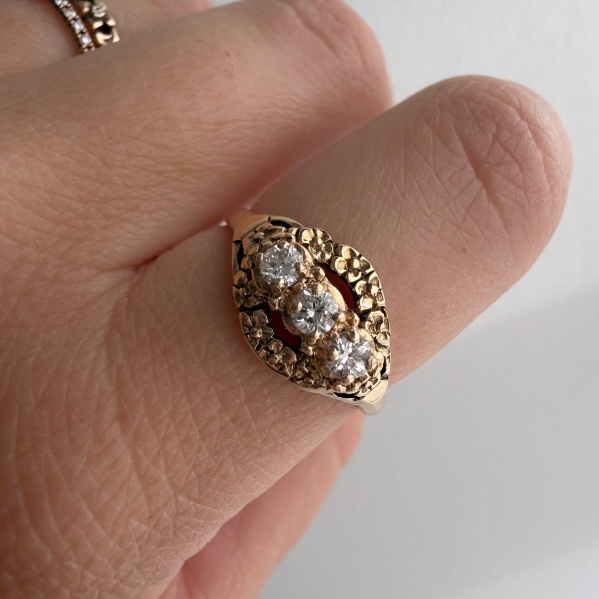 V I N T A G E // floral resilience / 1930s three stone floral east west navette ring with new diamonds / size 7