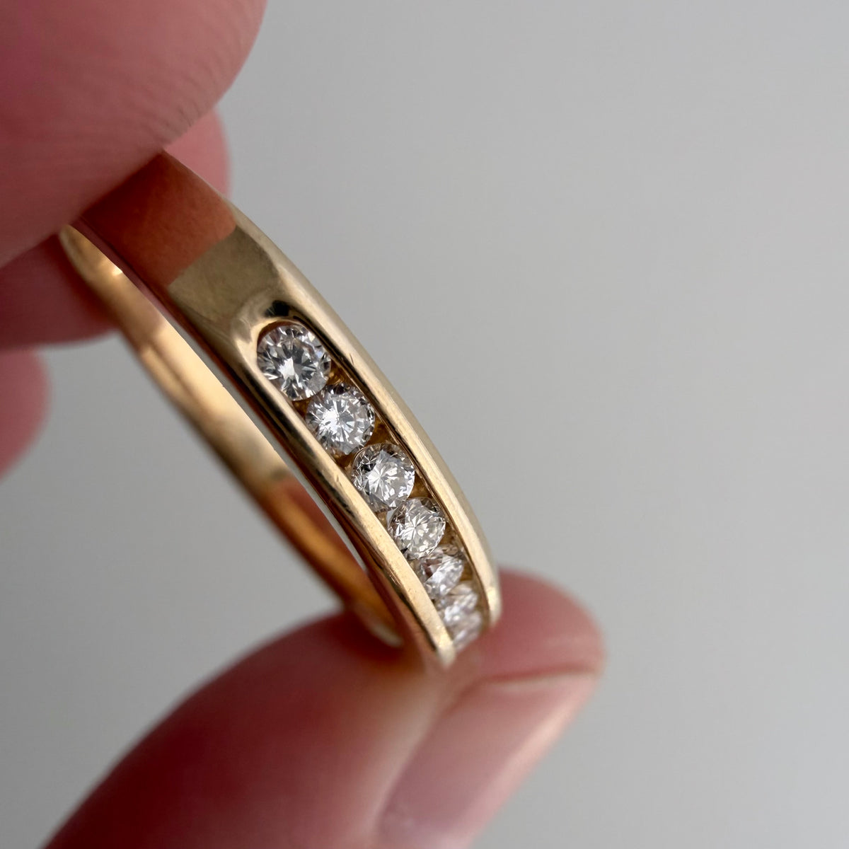 V I N T A G E // decadent sparkle / 14k yellow gold and 10 channel set diamond half eternity band / size 6.75