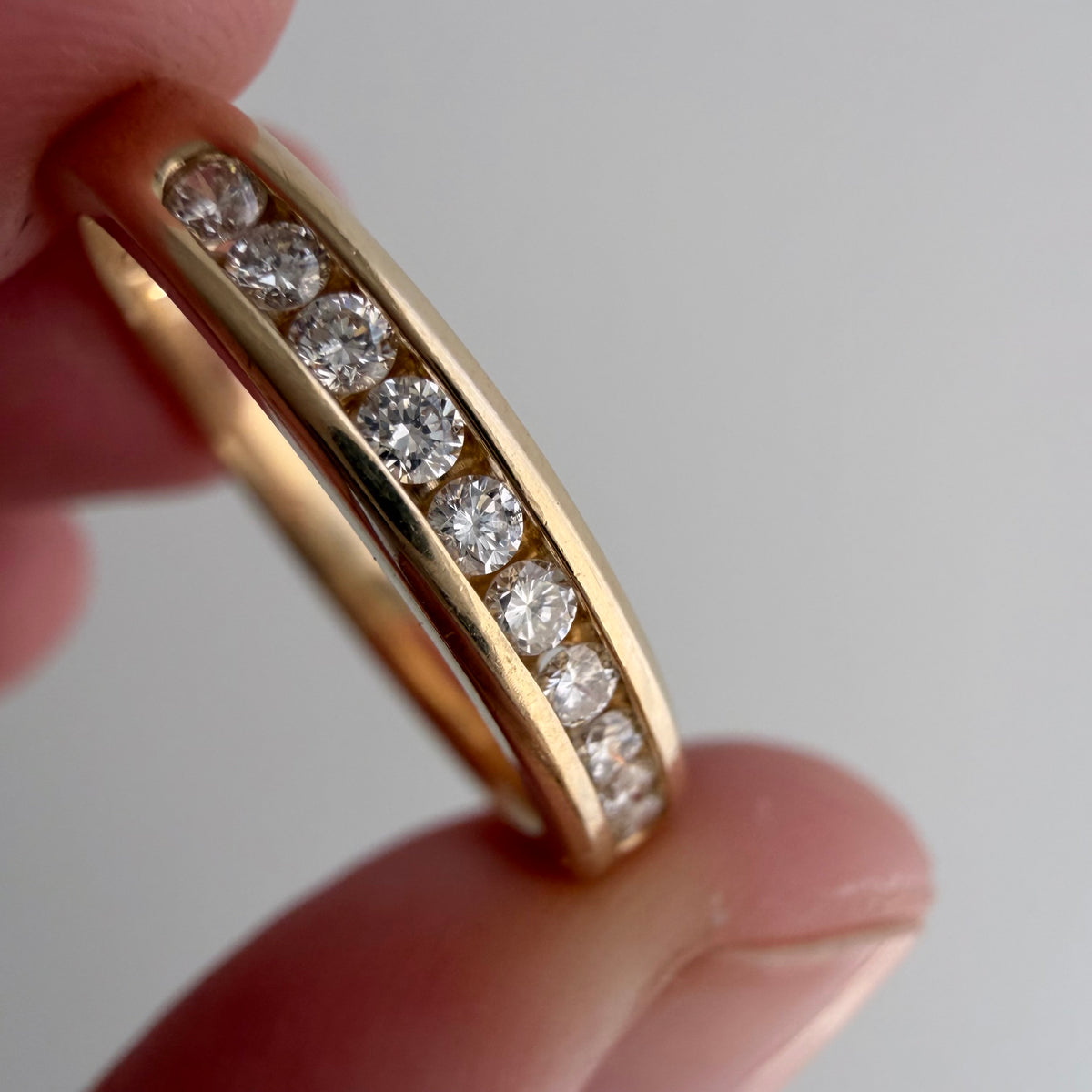 V I N T A G E // decadent sparkle / 14k yellow gold and 10 channel set diamond half eternity band / size 6.75