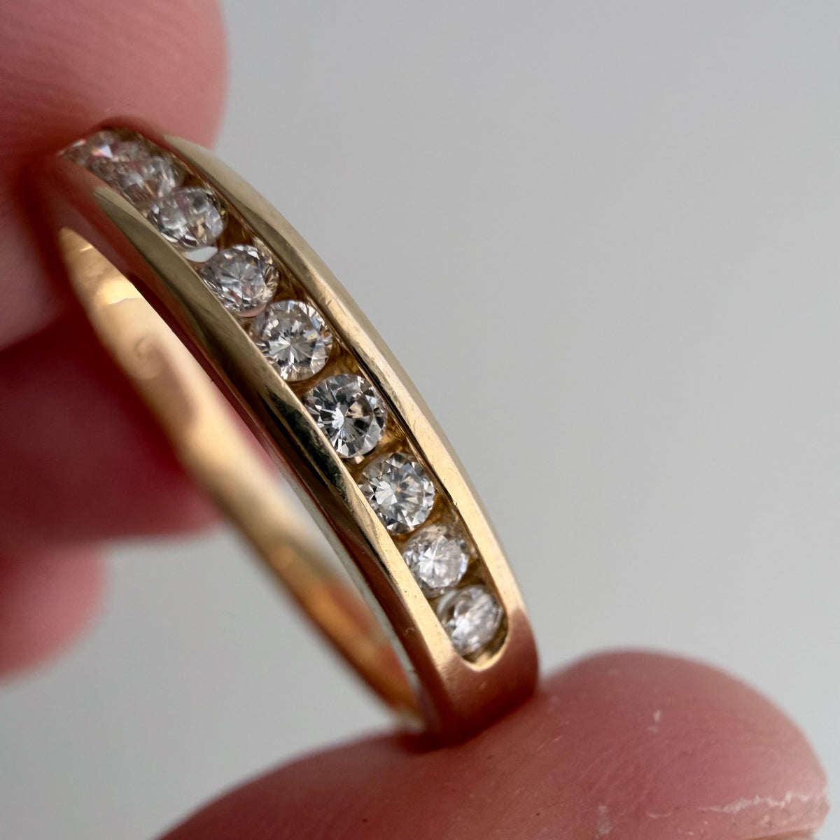 V I N T A G E // decadent sparkle / 14k yellow gold and 10 channel set diamond half eternity band / size 6.75