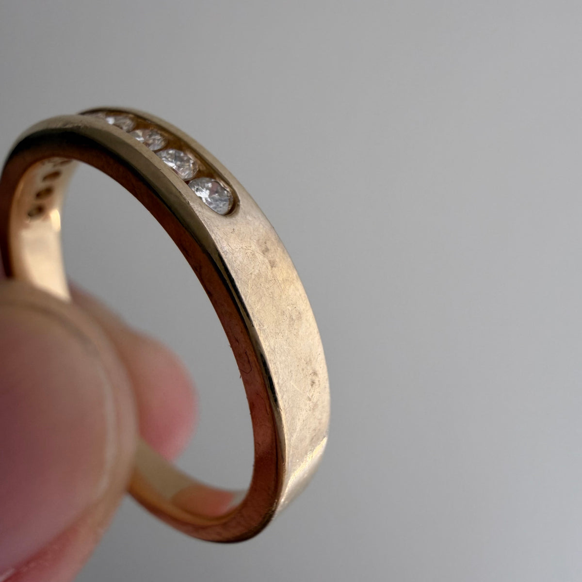 V I N T A G E // decadent sparkle / 14k yellow gold and 10 channel set diamond half eternity band / size 6.75
