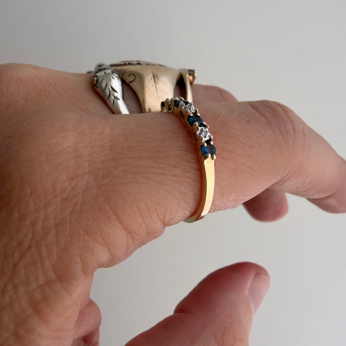 V I N T A G E // diverse blues / 10k half eternity band with topaz and diamonds / size 7.25