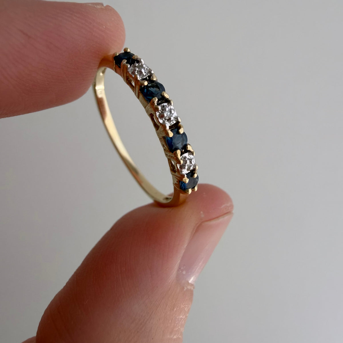V I N T A G E // diverse blues / 10k half eternity band with topaz and diamonds / size 7.25