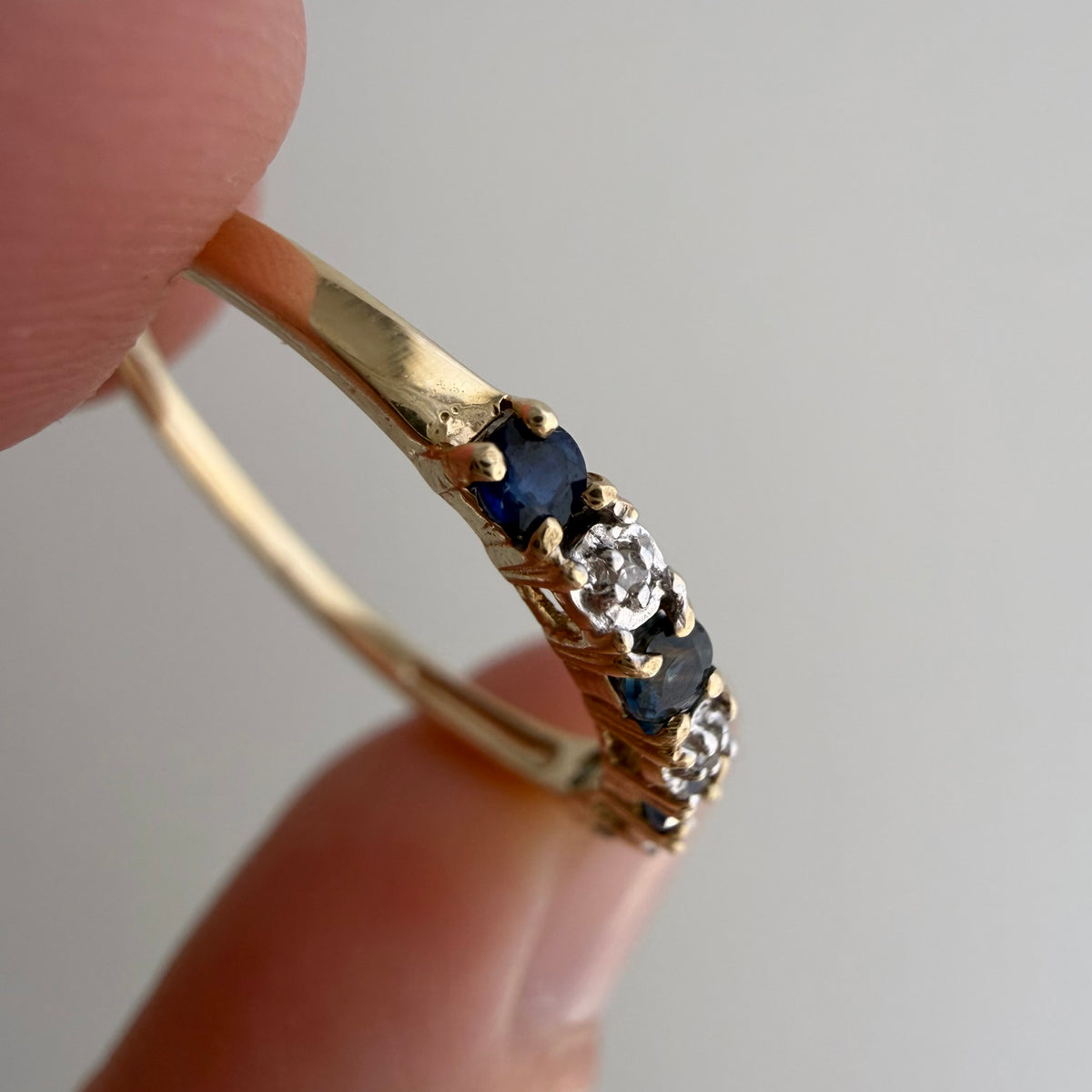 V I N T A G E // diverse blues / 10k half eternity band with topaz and diamonds / size 7.25