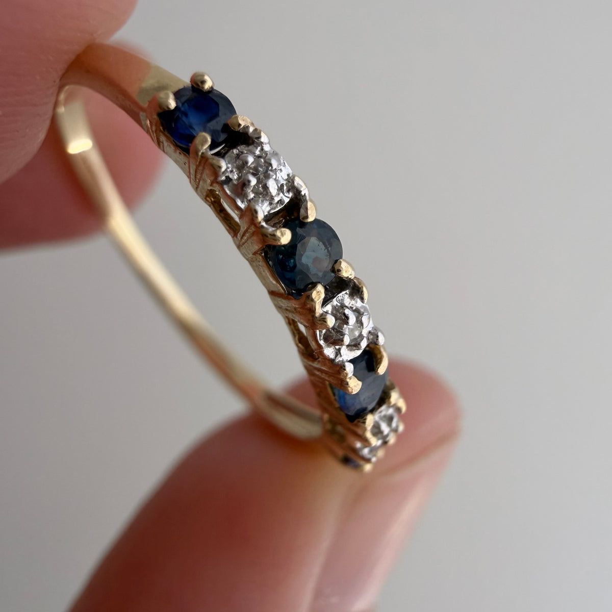 V I N T A G E // diverse blues / 10k half eternity band with topaz and diamonds / size 7.25