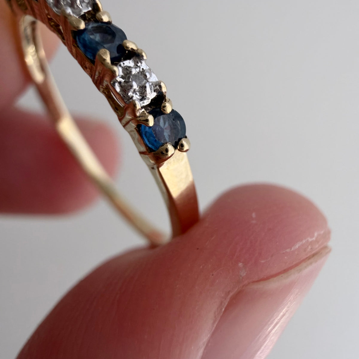 V I N T A G E // diverse blues / 10k half eternity band with topaz and diamonds / size 7.25