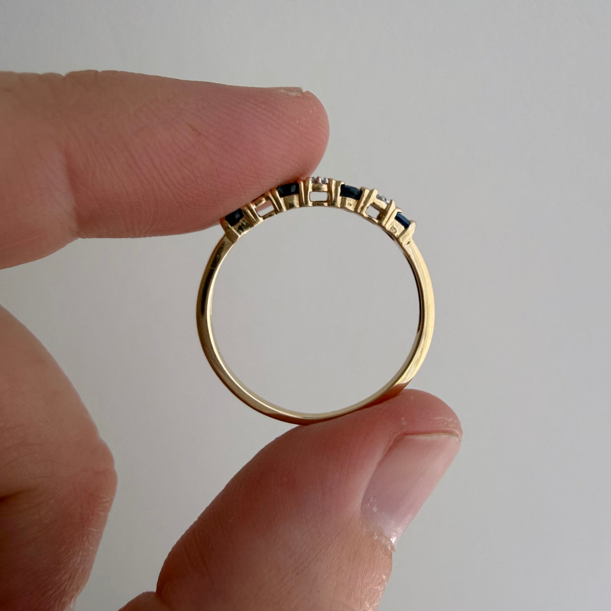 V I N T A G E // diverse blues / 10k half eternity band with topaz and diamonds / size 7.25